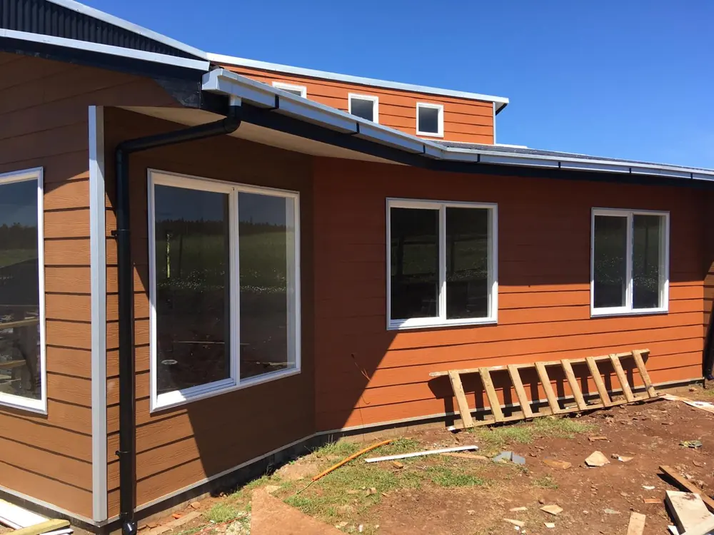 Vivienda rural DS10 de madera con cubiertas a distinto nivel